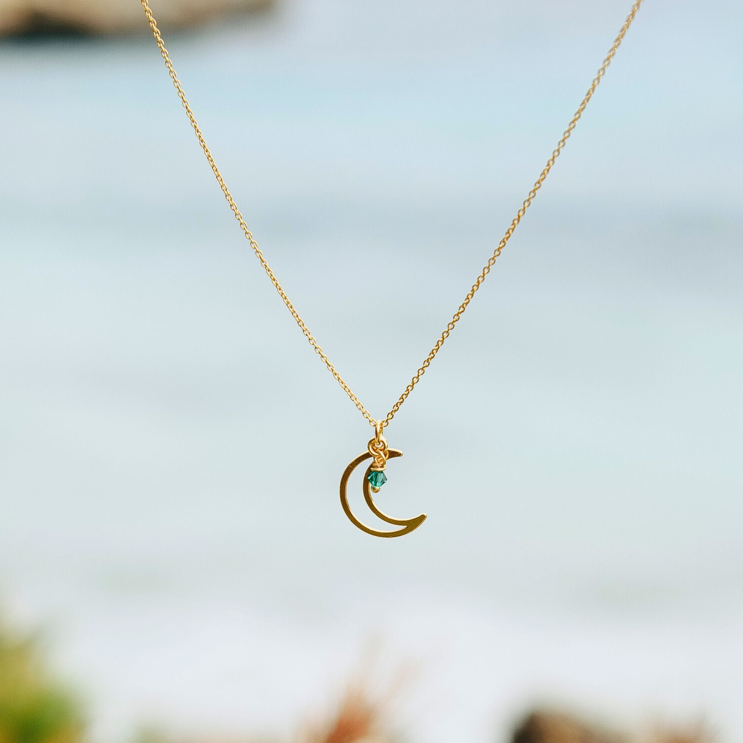 halsketting met maan bedel