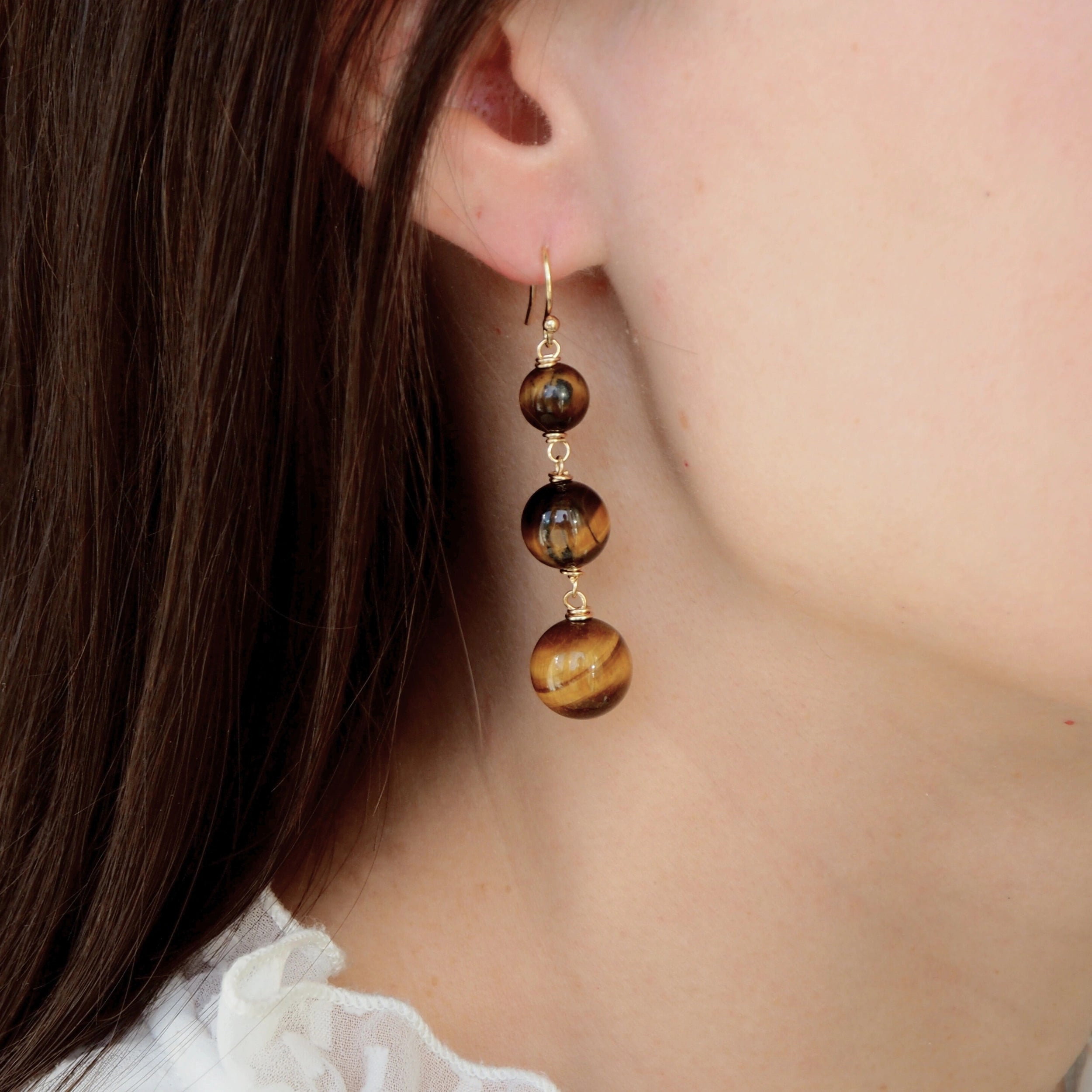 lange oorbellen met tijgeroog