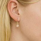 Handgemaakte oorbellen zoetwaterparels en opaal Oorbellen - Jewels with Flair