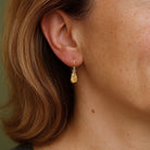 minimalistische oorbellen met druppels van citrien