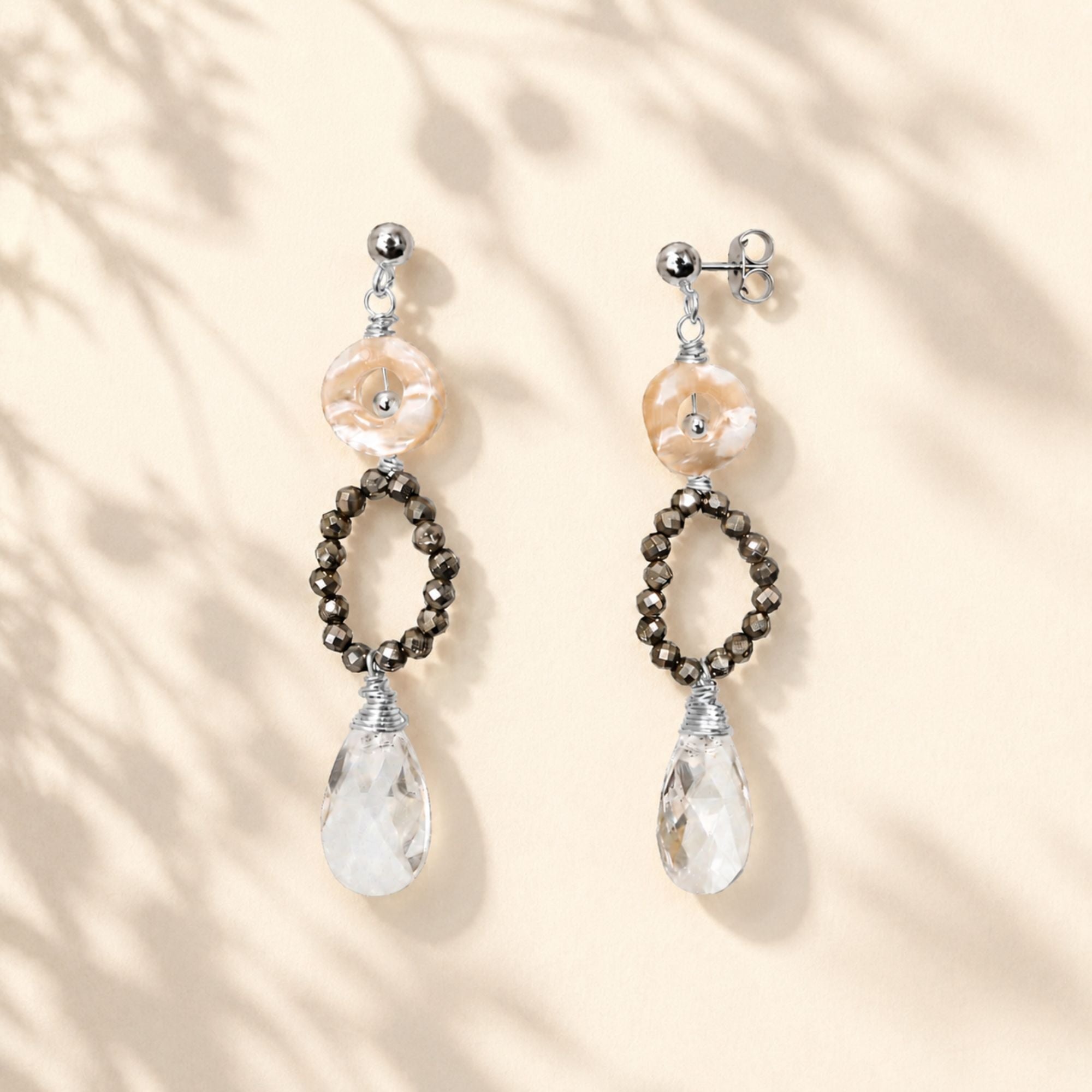 Lange oorbellen pyriet en swarovski druppels